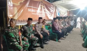 Personil Polsek Taliwang Hadiri Pembukaan STQ Ke XV Tingkat Kecamatan Brang Ene