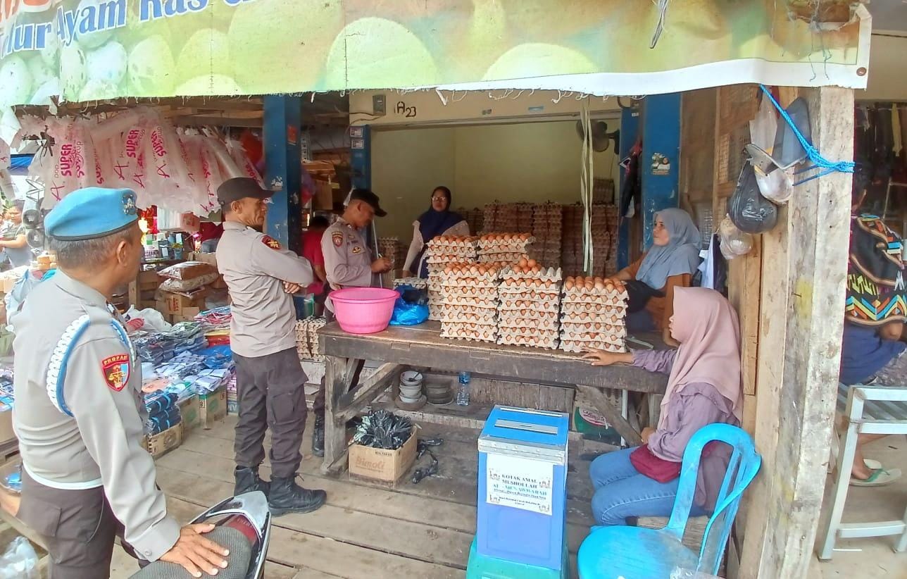 Polsek Woha, Pantau Langsung Harga Sembako di Pasar Tradisional Tente Pada Bulan Ramadhan 1445 H