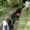 Babinsa Pahunga Lodu Bersama Warga Gotong Royong Bersihkan Saluran Irigasi