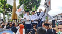 Ribuan Masa Pendukung, Relawan Dan Pengurus Partai Antar Pasangan Ivan-Dede Mendaftar Ke KPU Kota Tasikmalaya
