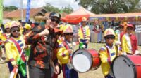 Pj. Bupati Tanggamus, Dr. Ir. Mulyadi Irsan, MT., Resmi Membuka Festival Drumband Satuan Pendidikan Tingkat TK, SD, dan SMP