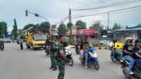 Personel Kodim dan Polres Sumba Timur Kawal Pawai Paslon Terpilih Usai Pleno KPU