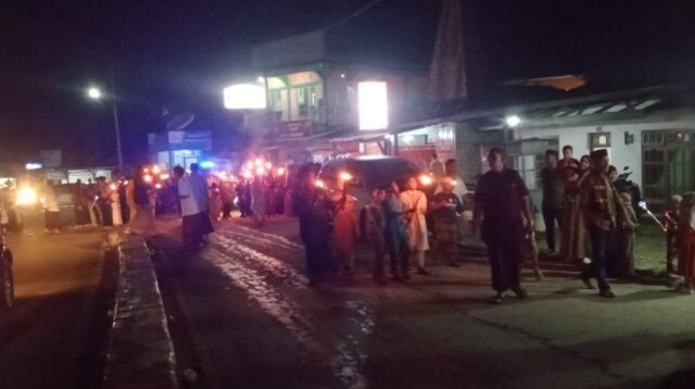 Anggota Polsek Katikutana Melaksanakan Pengamanan Pawai Obor Sambut Idul Fitri 1446 H/2025 M