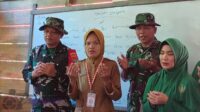 Dandim 0424/Tanggamus Salurkan Seragam dan Alat Tulis untuk Siswa di Pedalama